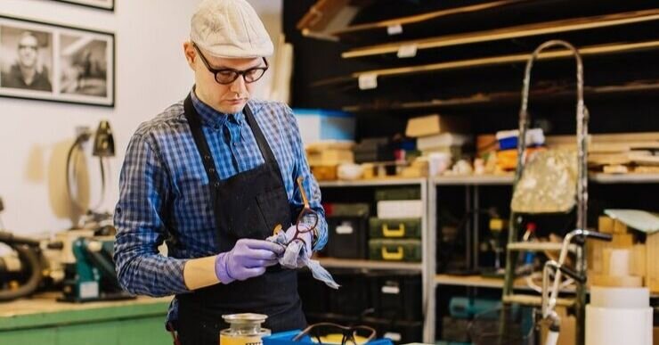 Craft production definition is a type of manufacturing business where products are built by hand, rejecting the assistance of robotics.